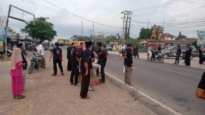 Wujud Kepedulian di Bulan Suci: PSHT dan GRIB Jaya Mesuji Bagikan Ratusan Takjil